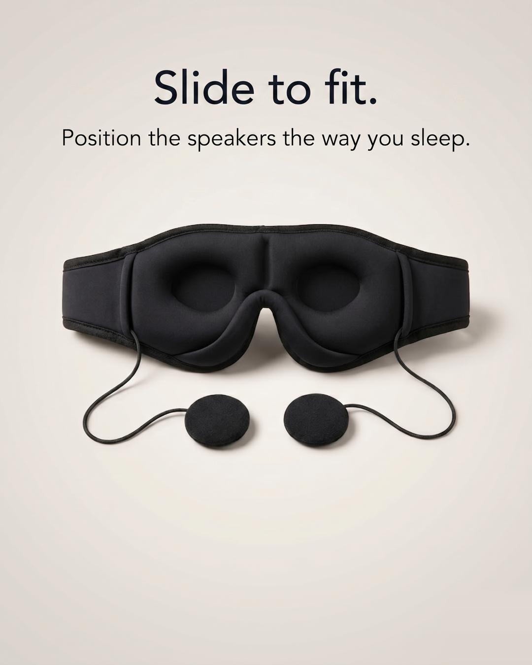 Round disc speakers pulled out on their slide-to-fit cords